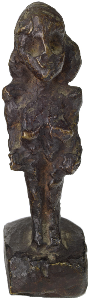 A sculpture of an abstracted human figure. The legs are narrow, the torso is slightly wider. Her eyes are only indicated by large eye sockets. Looks a bit like quickly kneaded.