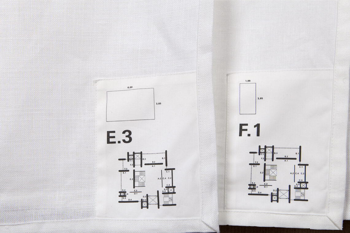 Two fabric samples with floor plans of the Kunsthalle museum rooms.